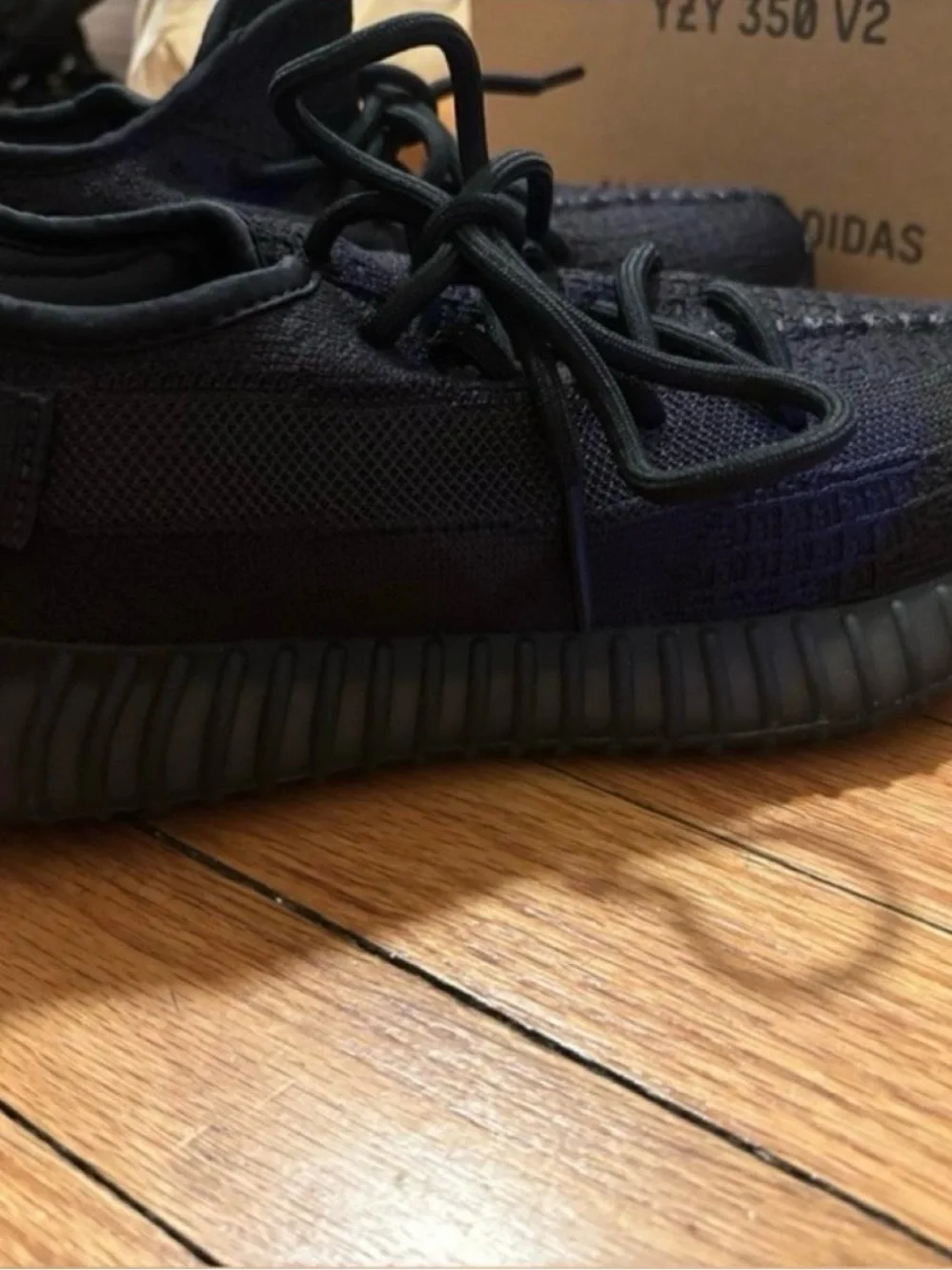 Black Adidas Yeezy 350 V2 Sneakers